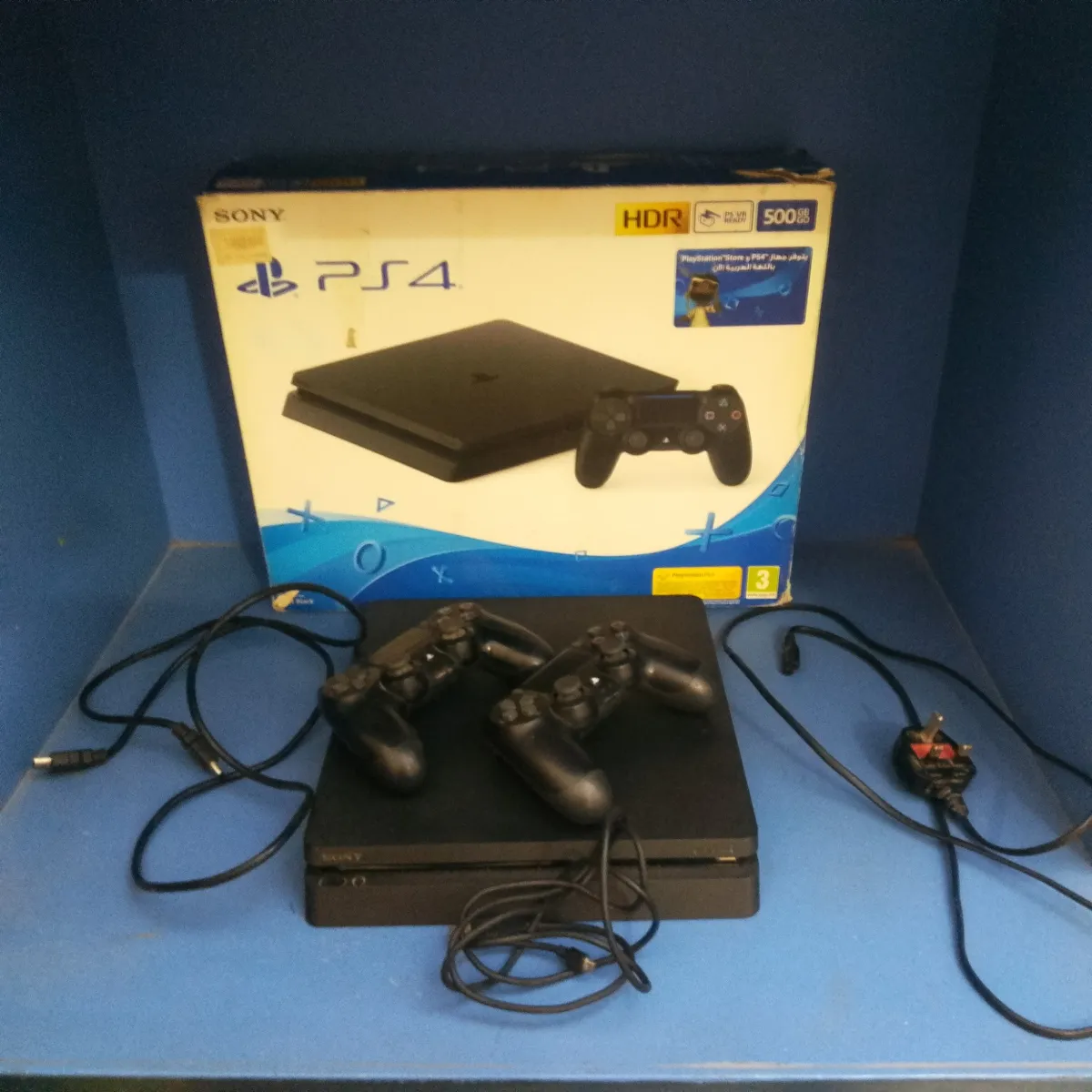Playstation 4 slim 500gb with original box and accessories sealed and non jailbr