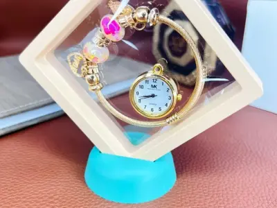 Golden Women Bracelet Watch with Chic Dial and Elegant Strap