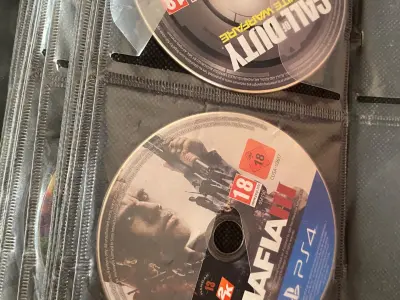 Ps4 disks 70+ games - photo 3