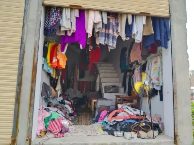 Used Clothing Shop Setup with Stock and Fixtures