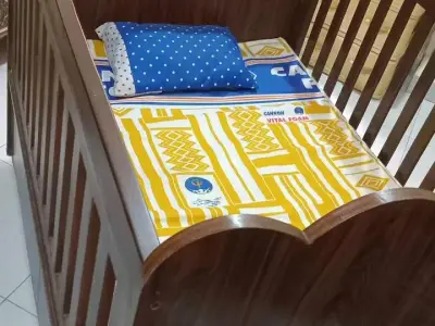 custom-made wooden baby cot in XL size . . with mattress
